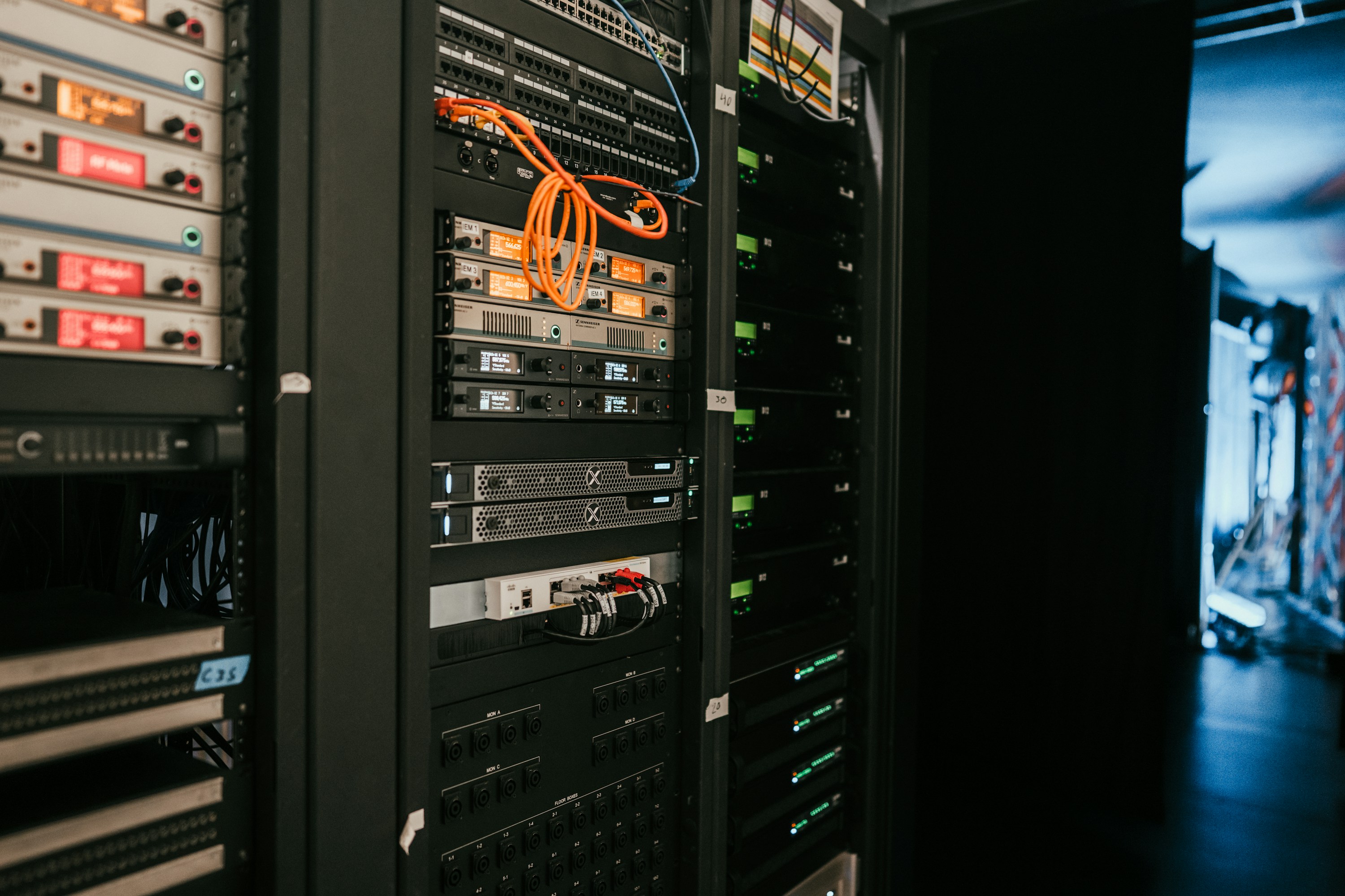 Server rack hardware and orange cabling